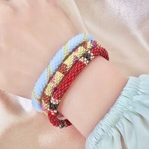 Lot of Three Lily and Laura Handcrafted Nepal Glass Seed Bead Roll On Bracelets
